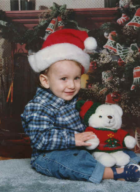 cameron - 1 year & 2 months - in santa hat.jpg (612319 bytes)