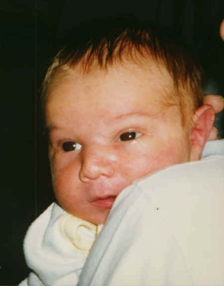 cameron - 3 weeks - on Christopher.jpg (145242 bytes)