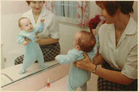 Chris - Judy hold him up to the mirror.jpg (190377 bytes)